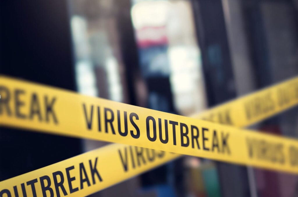 ウイルス感染拡大を警告する黄色いテープのイメージ